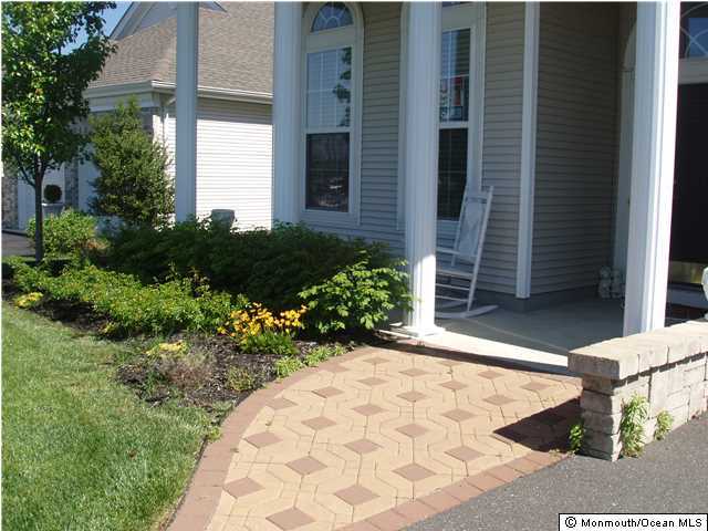 8 Nottingham Way Jackson, NJ 08527 - Photo 2 of 24 a view of a backyard of the house