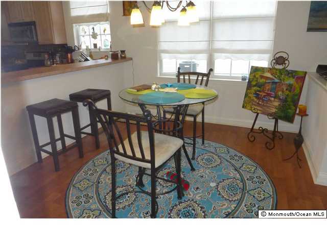 8 Nottingham Way Jackson, NJ 08527 - Photo 6 of 24 a view of a dining room with furniture