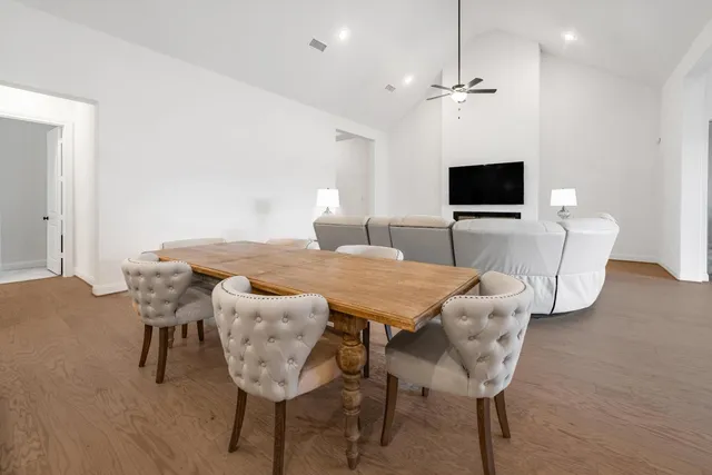 a view of a dining room with furniture