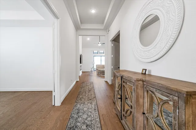 a view of a hallway with washer and dryer