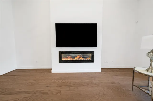 a view of a living room with a flat screen tv