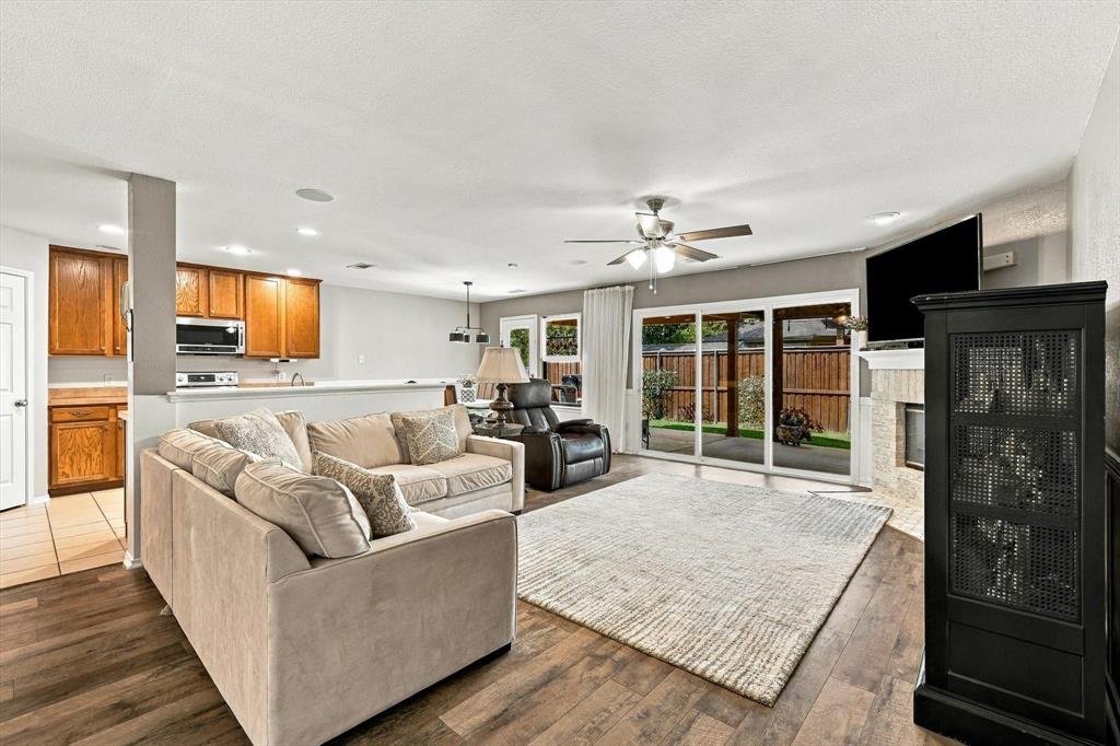 4301 Grassmere Road Fort Worth, TX 76244 - Photo 2 of 40 Open living and kitchen.