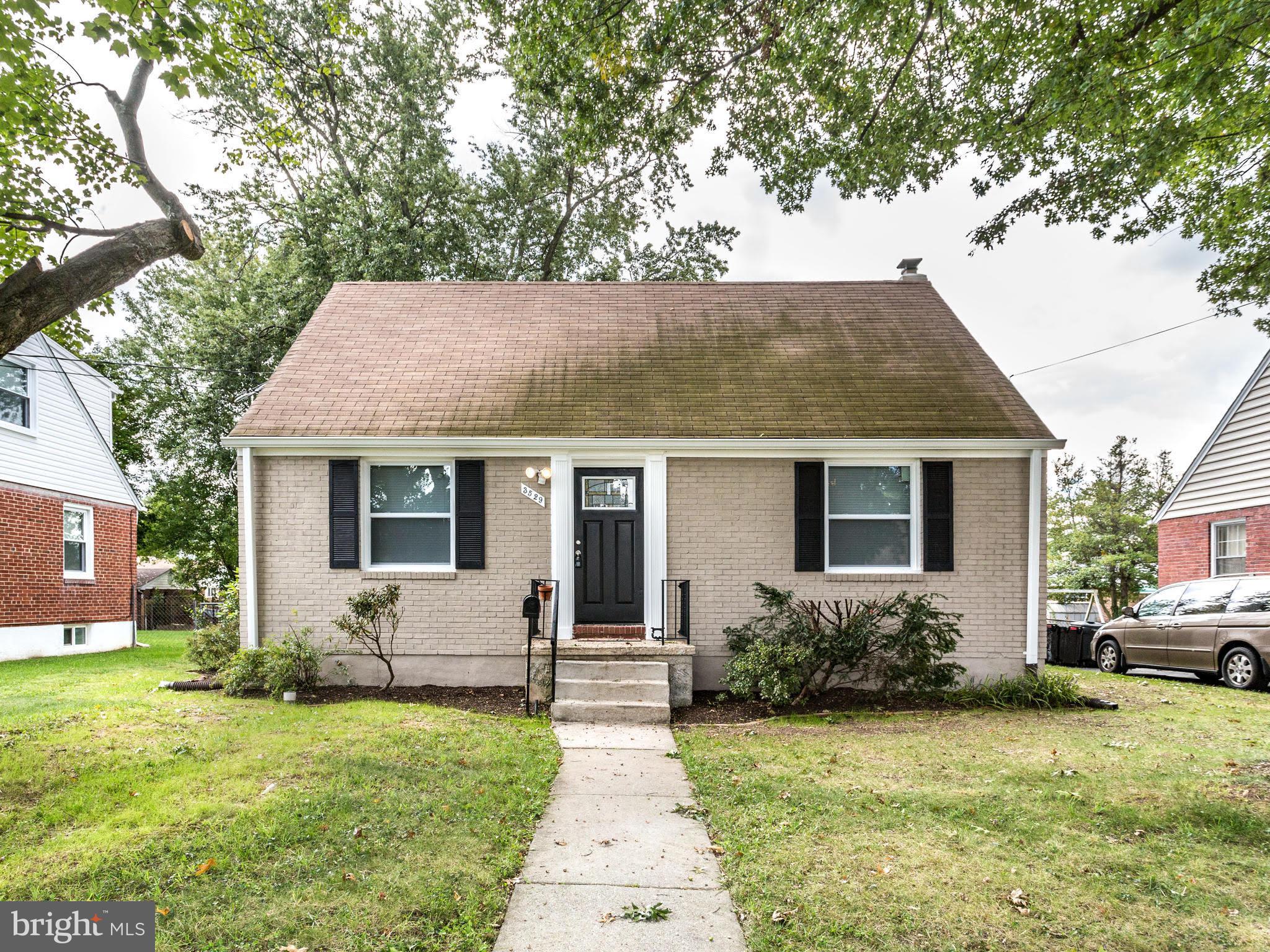 3529 Wild Cherry Road Baltimore, MD 21244 - Photo 1 of 30 a view of a house with a backyard