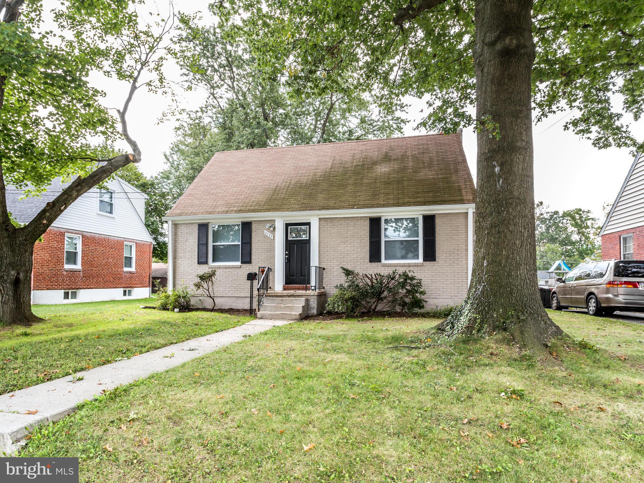 3529 Wild Cherry Road Baltimore, MD 21244 - Photo 2 of 30 a front view of house with yard and green space
