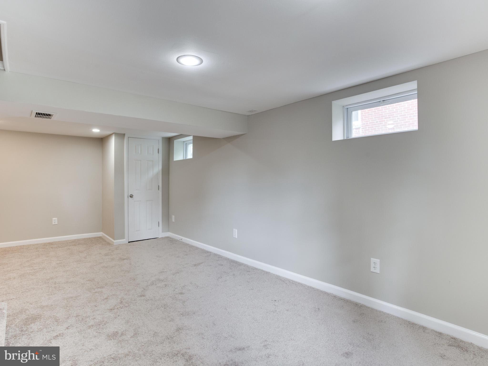 3529 Wild Cherry Road Baltimore, MD 21244 - Photo 25 of 30 a view of an empty room with a window