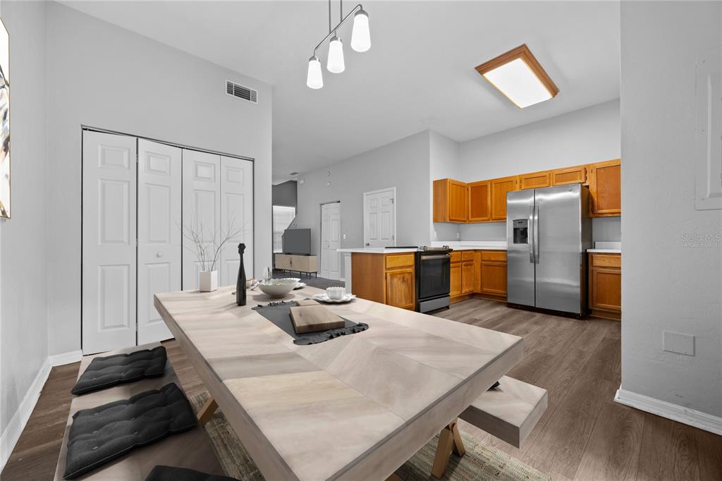 5291 Southwest 97 Way Gainesville, FL 32608 - Photo 11 of 24 a view of kitchen with sink microwave and refrigerator