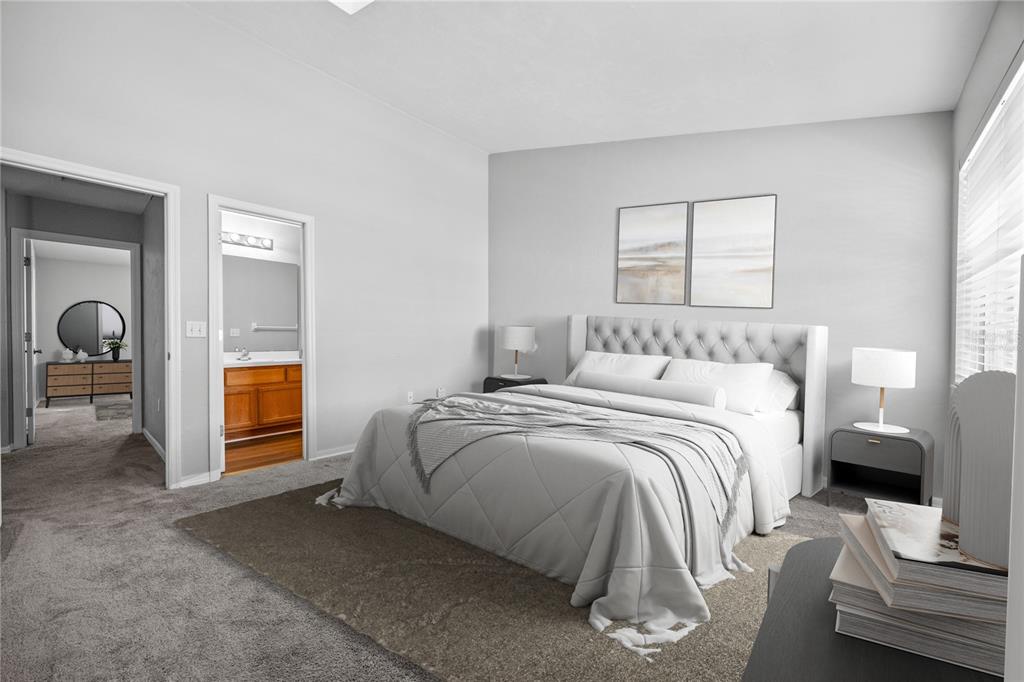 5291 Southwest 97 Way Gainesville, FL 32608 - Photo 19 of 24 a bedroom with a bed and a mirror