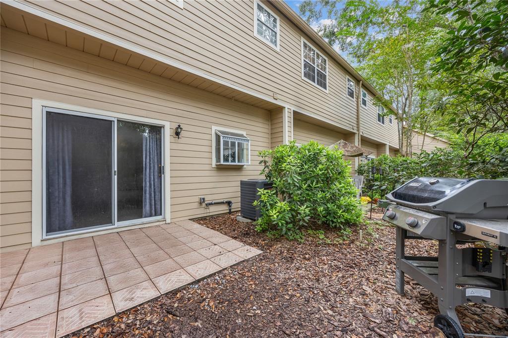 5291 Southwest 97 Way Gainesville, FL 32608 - Photo 22 of 24 a view of backyard with seating space