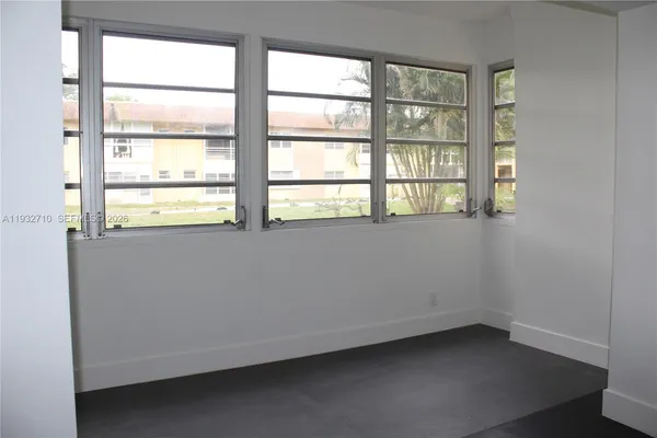 an empty room with a window
