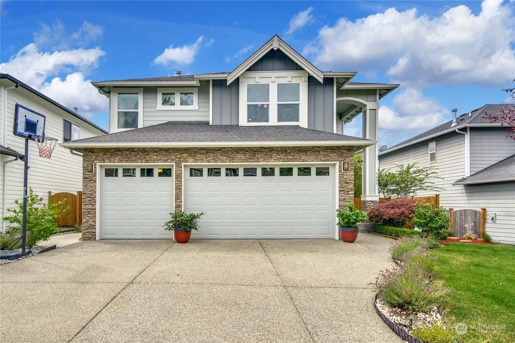 3604 222nd Place Southeast Bothell, WA 98021 - Photo 1 of 38 a front view of a house with garden
