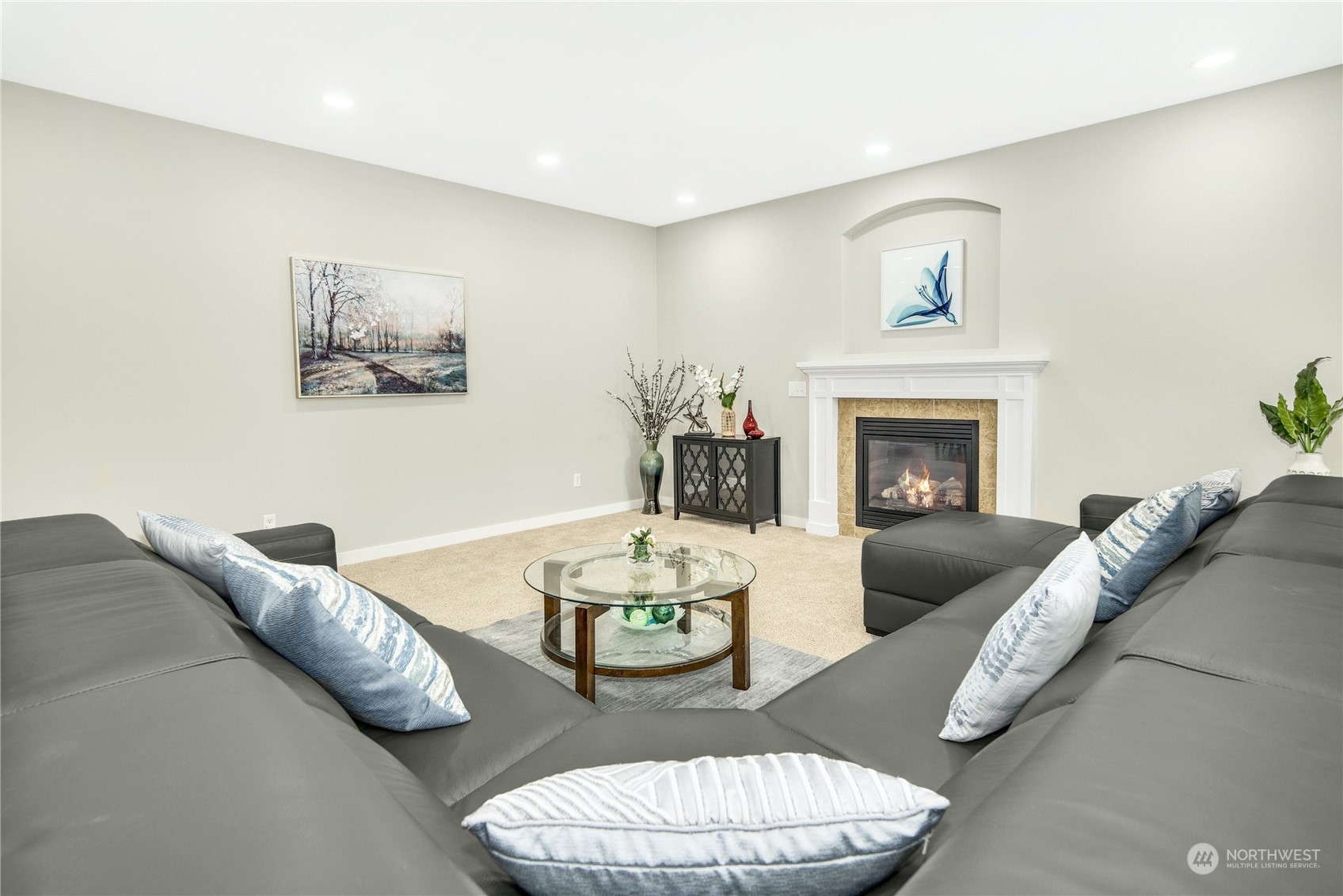 3604 222nd Place Southeast Bothell, WA 98021 - Photo 8 of 38 a living room with furniture and a fireplace