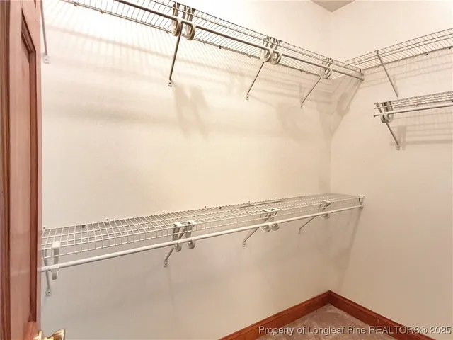 a view of a room with racks on the wall