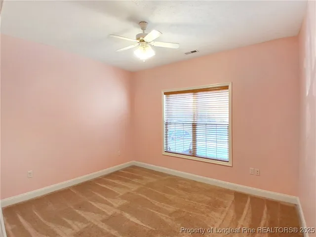 an empty room with window