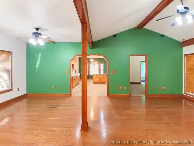 a view of a hallway with a back yard