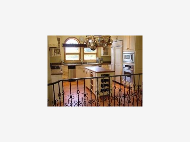 740 Skyward Drive Aptos, CA 95003 - Photo 3 of 8 a picture of a living room with a table and chairs next to a large window