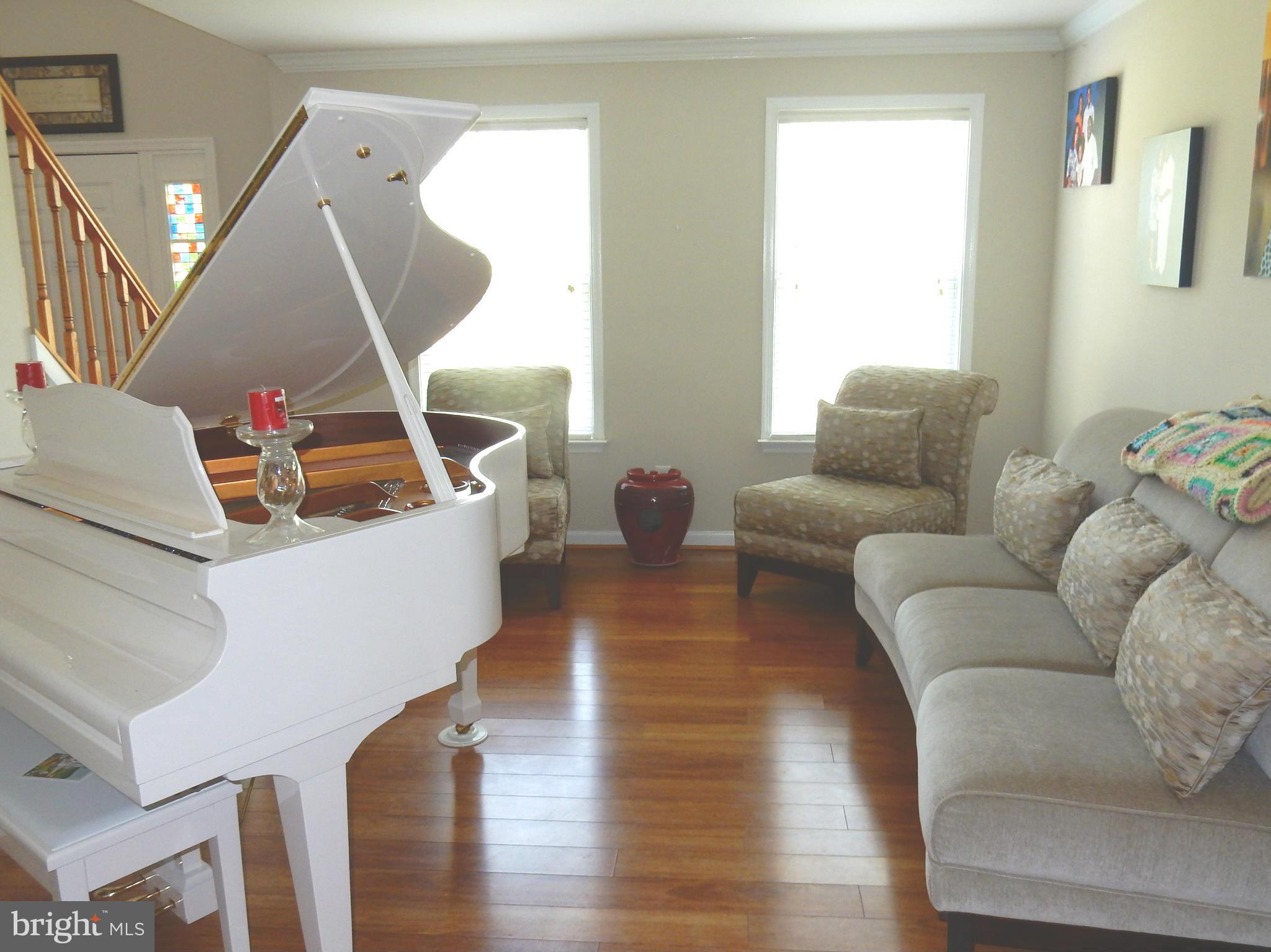 725 Rosewood Road Severn, MD 21144 - Photo 2 of 29 Gleaming Hardwood Floors Lots of Natural Light