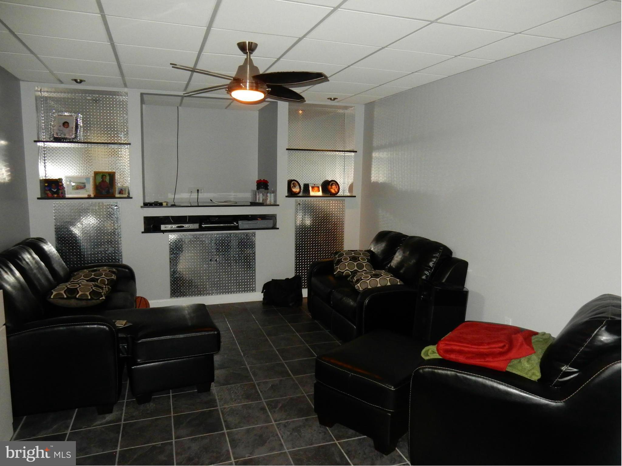 725 Rosewood Road Severn, MD 21144 - Photo 13 of 29 Basement TV Area