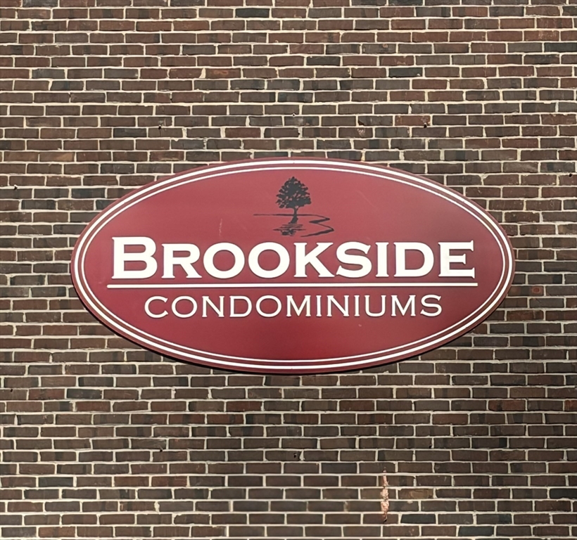 126 Beaver Street, Unit 65 Framingham, MA 01702 - Photo 13 of 15 a sign broad