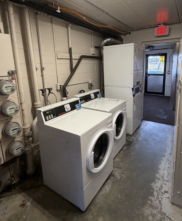 126 Beaver Street, Unit 65 Framingham, MA 01702 - Photo 10 of 15 a utility room with dryer and washer