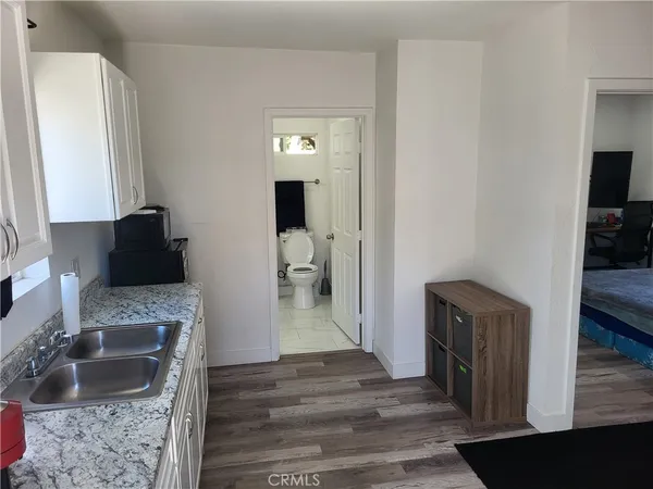 a room with furniture and a flat screen tv