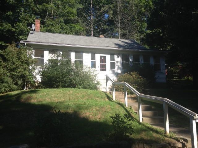 14 Castle Meadow Road Newtown, CT 06470 - Photo 1 of 1 a front view of a house with yard and green space