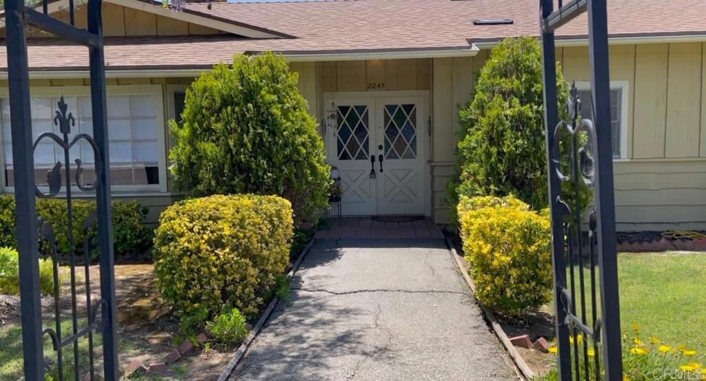 2045 Oak Hill Drive Escondido, CA 92027 - Photo 2 of 2 a view of a porch with garden
