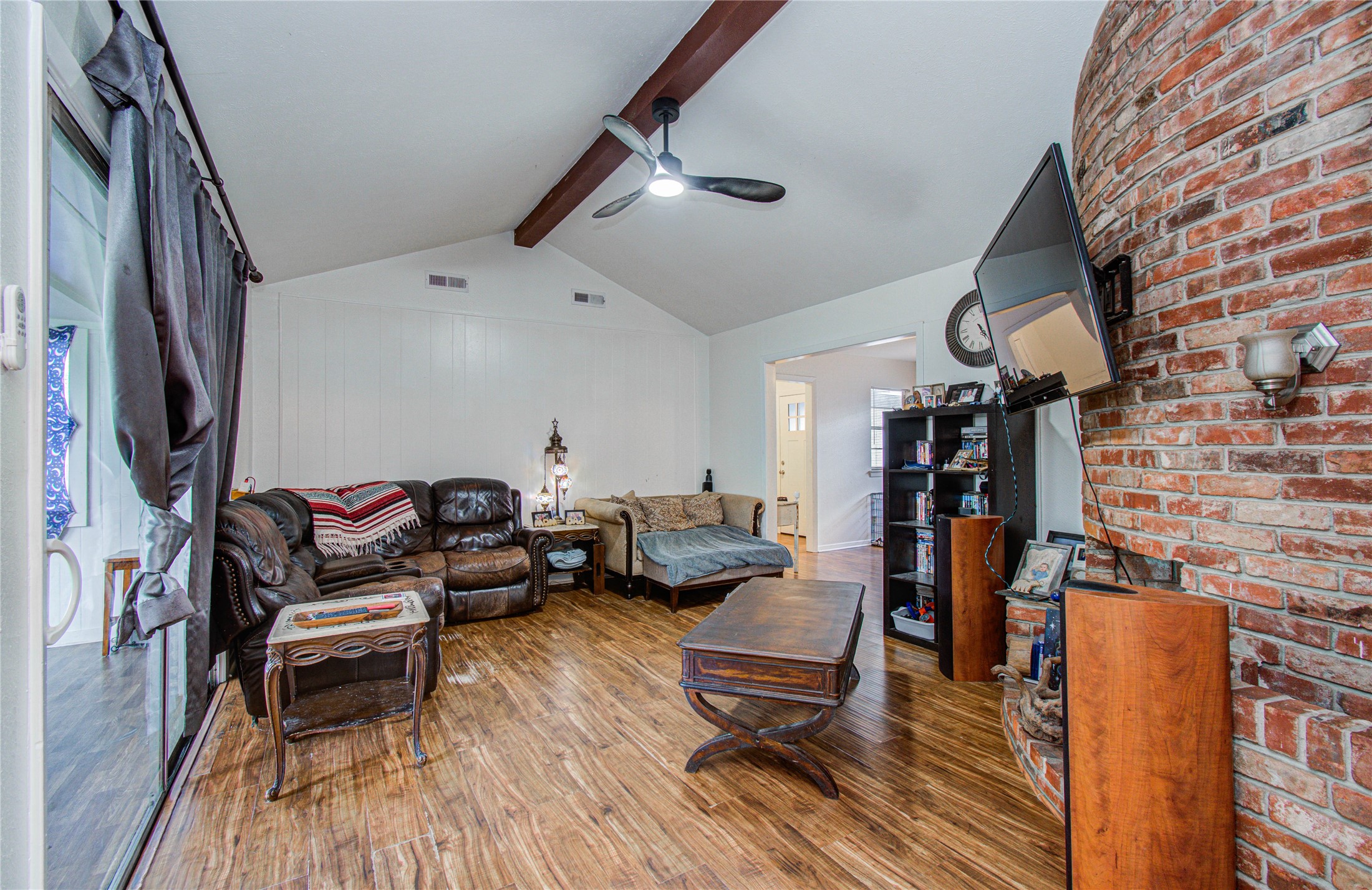 1710 West 11th Street Freeport, TX 77541 - Photo 11 of 34 a living room with furniture and wooden floor
