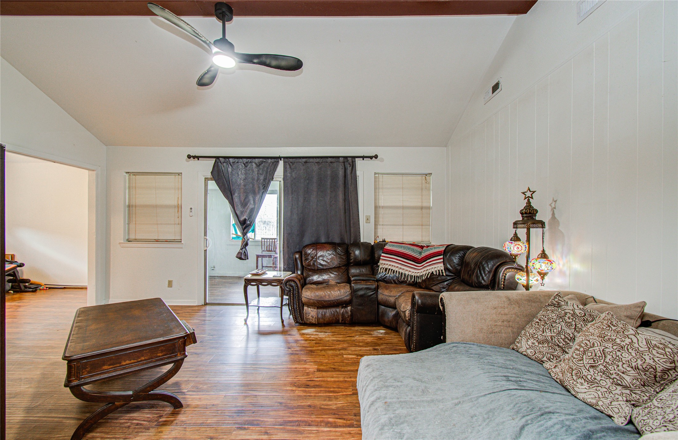 1710 West 11th Street Freeport, TX 77541 - Photo 10 of 34 a living room with furniture and wooden floor