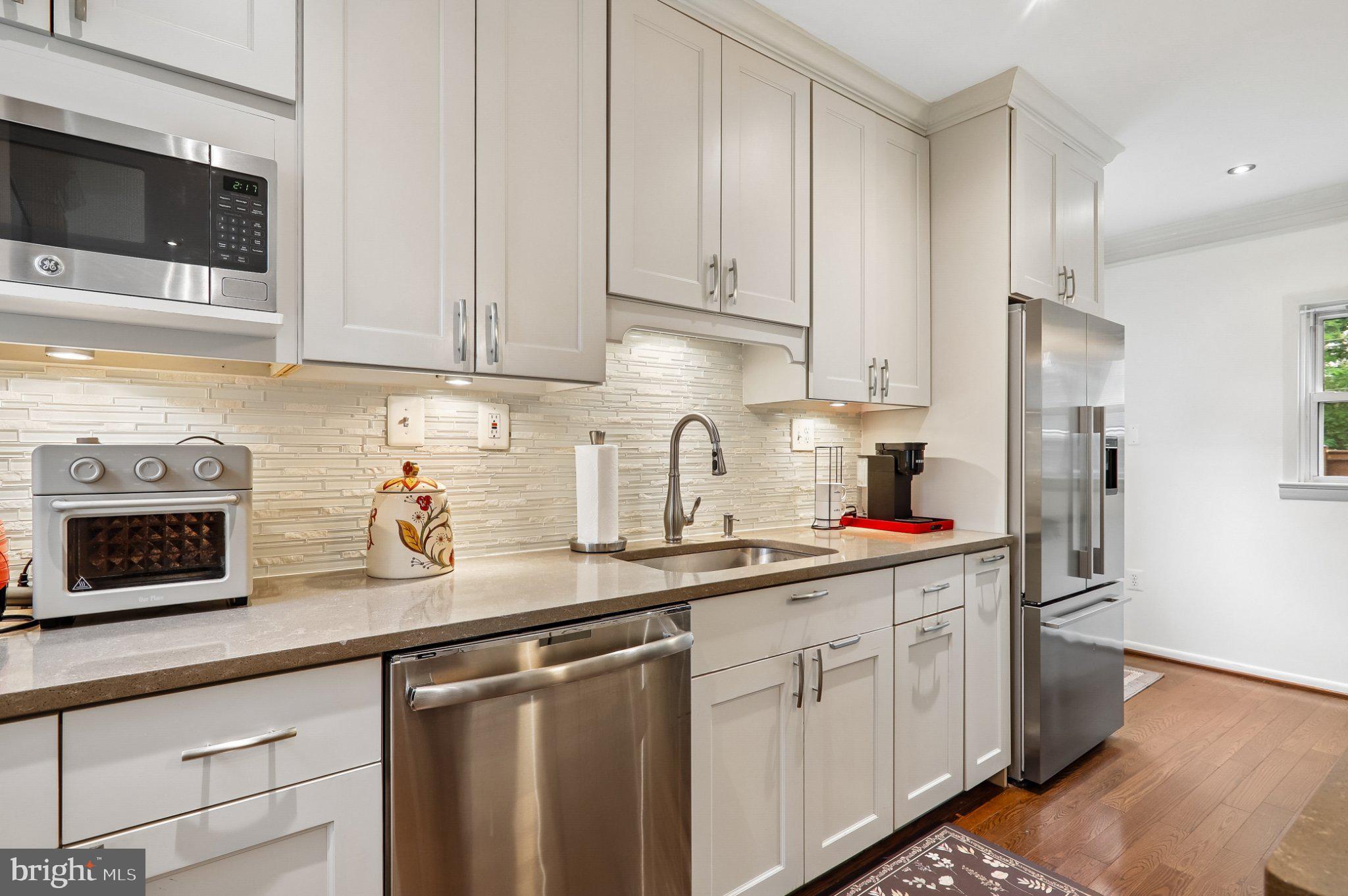 3103 Walnut Street Northeast Washington, DC 20018 - Photo 15 of 40 Modern kitchen with sleek finishes.