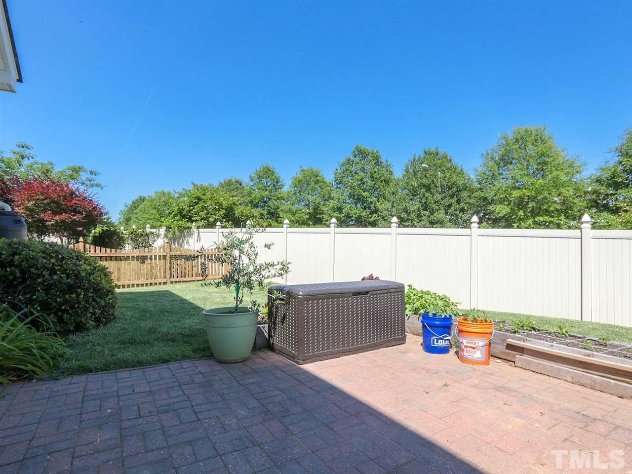 8204 Shadow Stone Court Raleigh, NC 27613 - Photo 20 of 21 a view of a backyard with sitting area