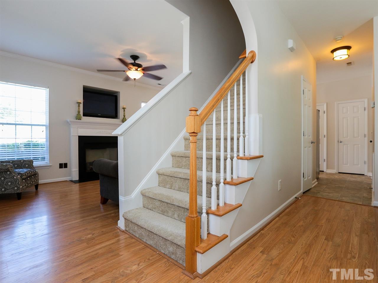 8204 Shadow Stone Court Raleigh, NC 27613 - Photo 3 of 21 a view of entryway and hall with wooden floor