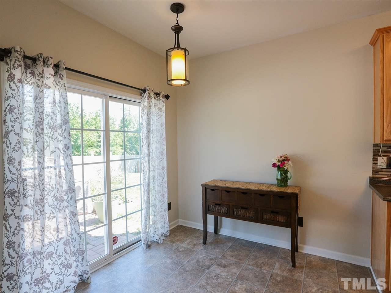 8204 Shadow Stone Court Raleigh, NC 27613 - Photo 7 of 21 a view of room with furniture and a window