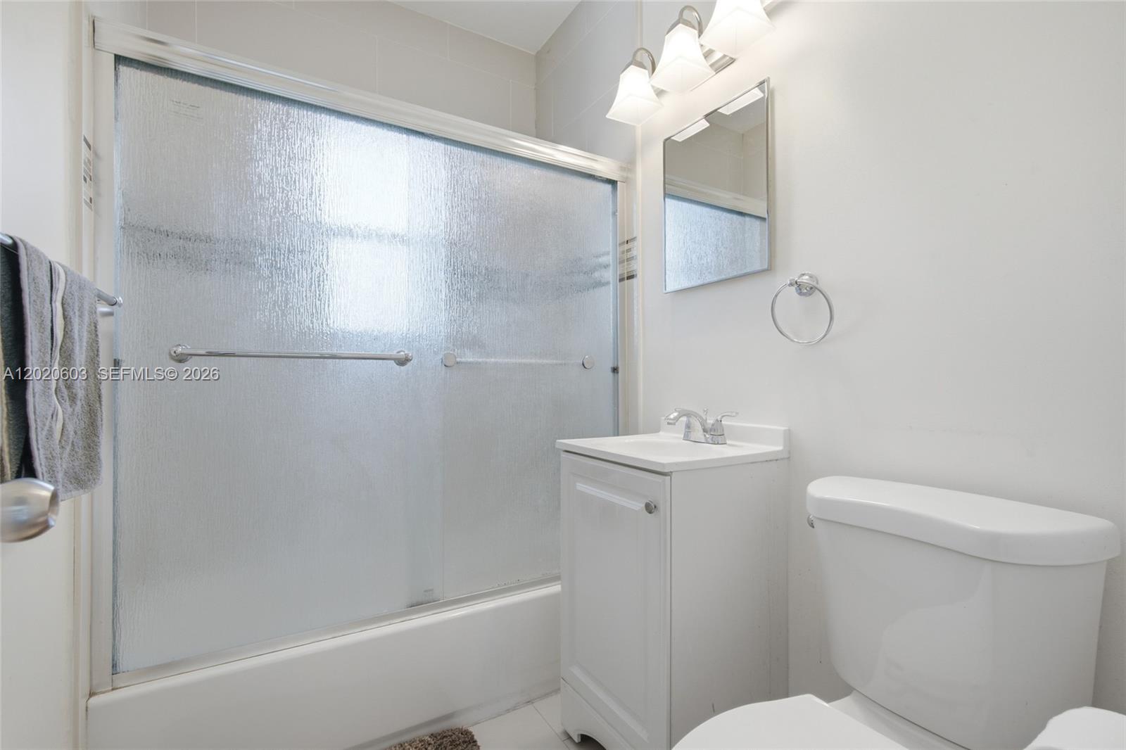 3750 Southwest 27th Street Miami, FL 33134 - Photo 25 of 41 a bathroom with a toilet a sink and shower