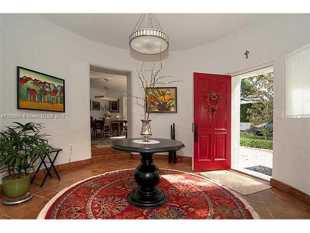 5100 La Gorce Drive Miami Beach, FL 33140 - Photo 3 of 25 a living room with furniture and a potted plant