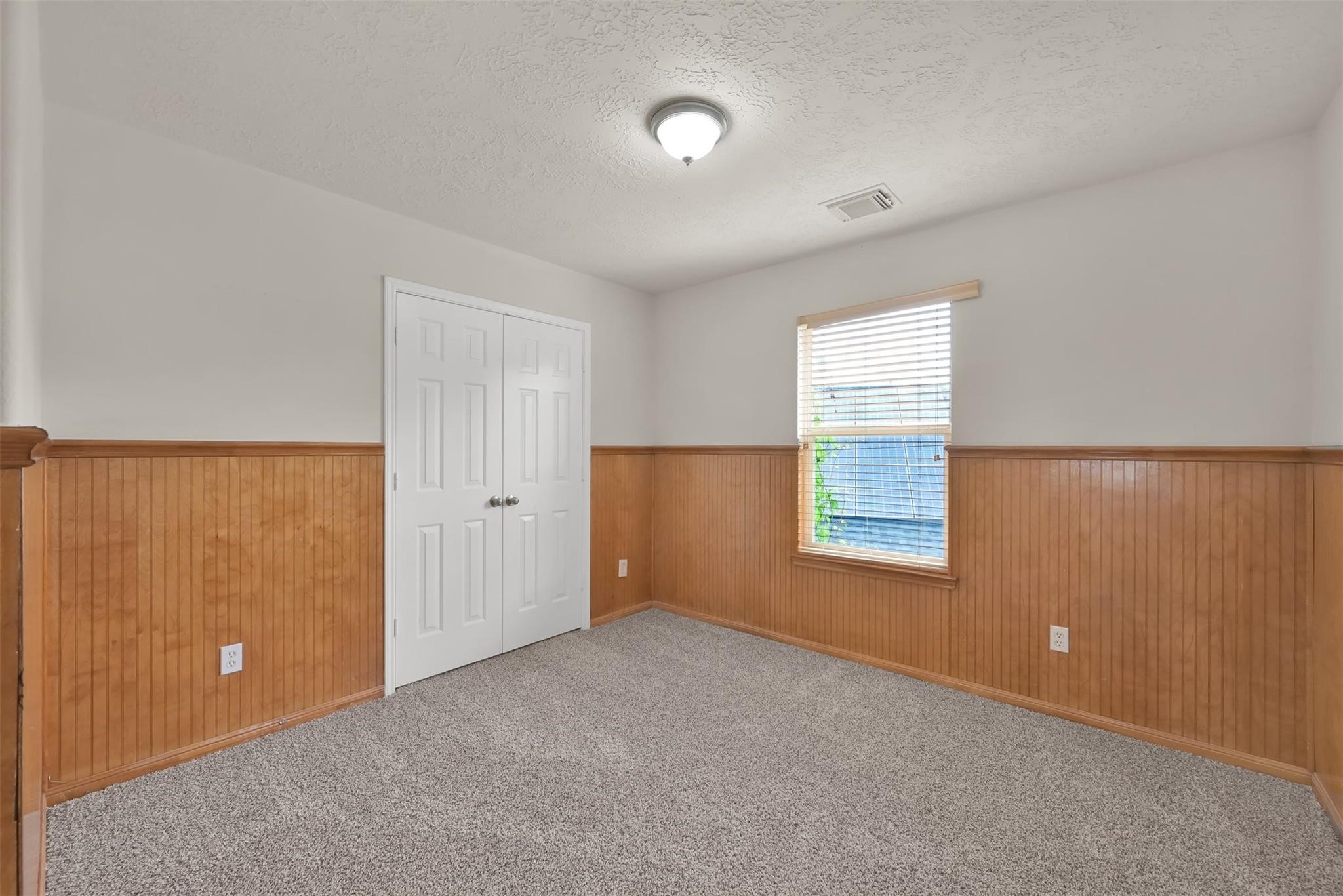 1443 Meadowhigh Lane Spring, TX 77373 - Photo 19 of 23 a view of an empty room with a window