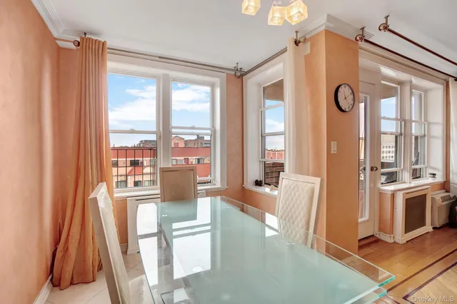 a view of a living room and a balcony