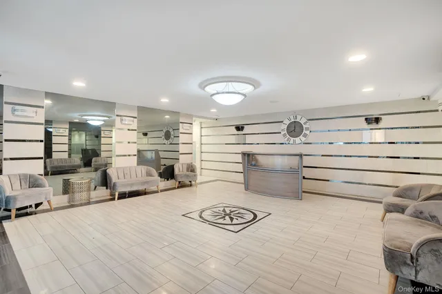 a room with lot of bed and a couch