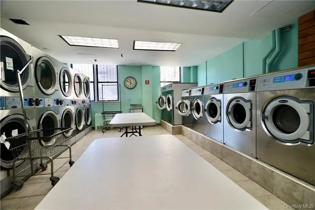 a view of a room with washer and dryer