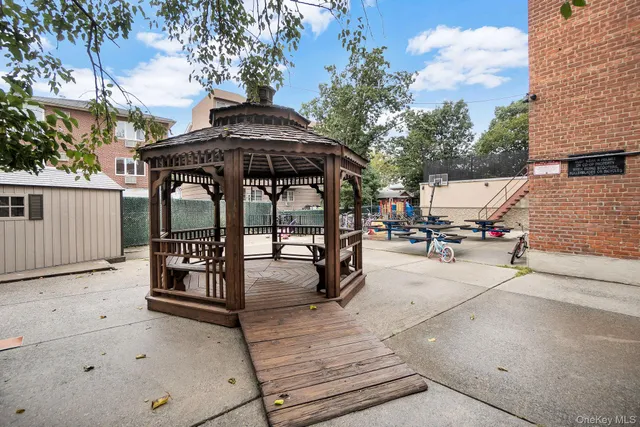 a view of a street with sitting area