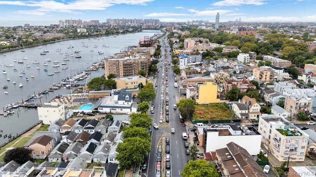 a front view of a building with many windows