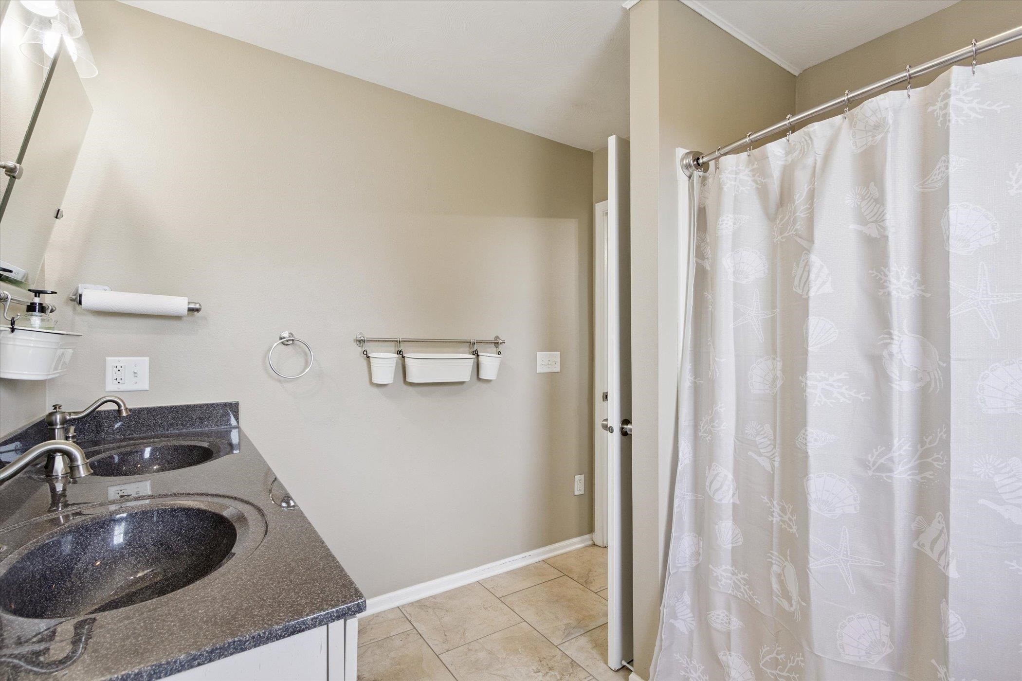 8548 East Edwardsville Road German Valley, IL 61039 - Photo 20 of 70 a bathroom with a sink a toilet and shower