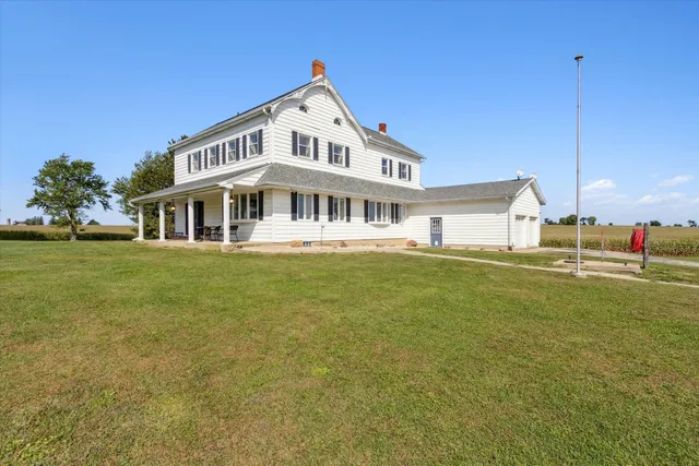 a view of a house with a big yard