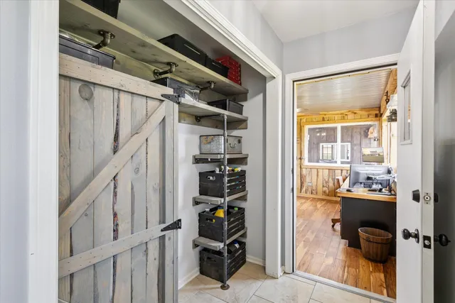 a view of a lake with a house in the background