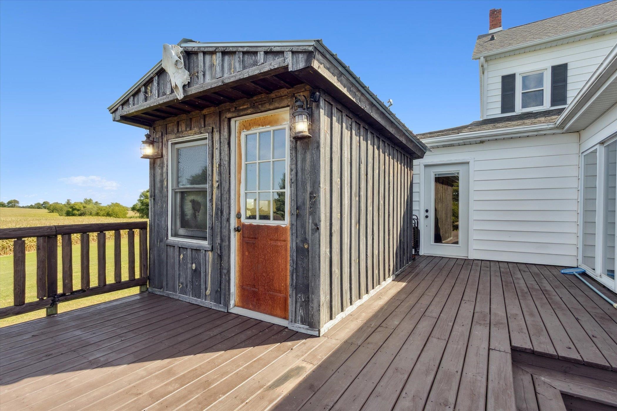 8548 East Edwardsville Road German Valley, IL 61039 - Photo 46 of 70 a view of wooden house with a wooden deck