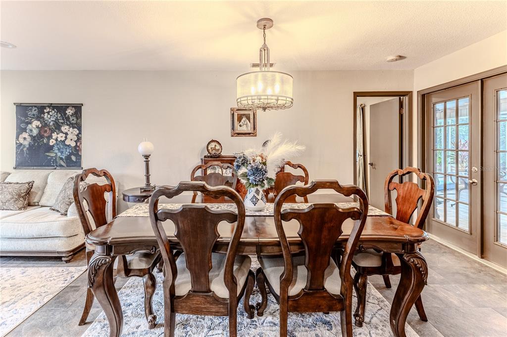 8480 Colma Street Spring Hill, FL 34606 - Photo 18 of 70 a view of a dining room with furniture window and outside view