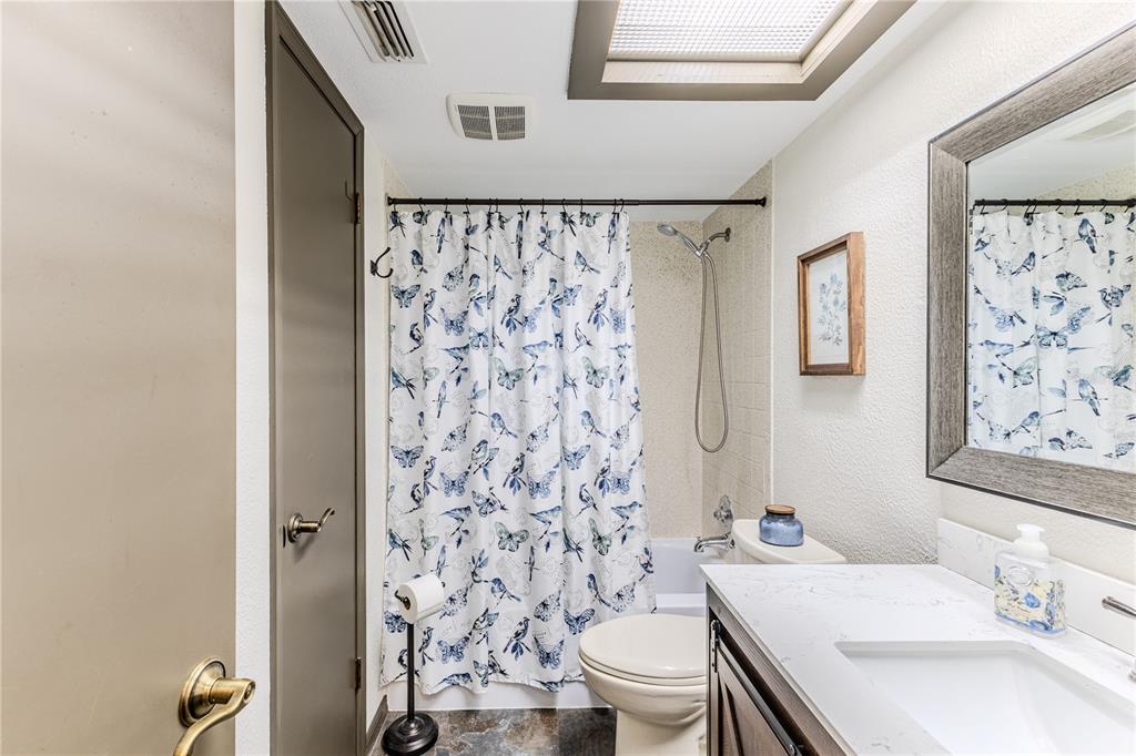 8480 Colma Street Spring Hill, FL 34606 - Photo 41 of 70 a bathroom with a sink toilet and shower