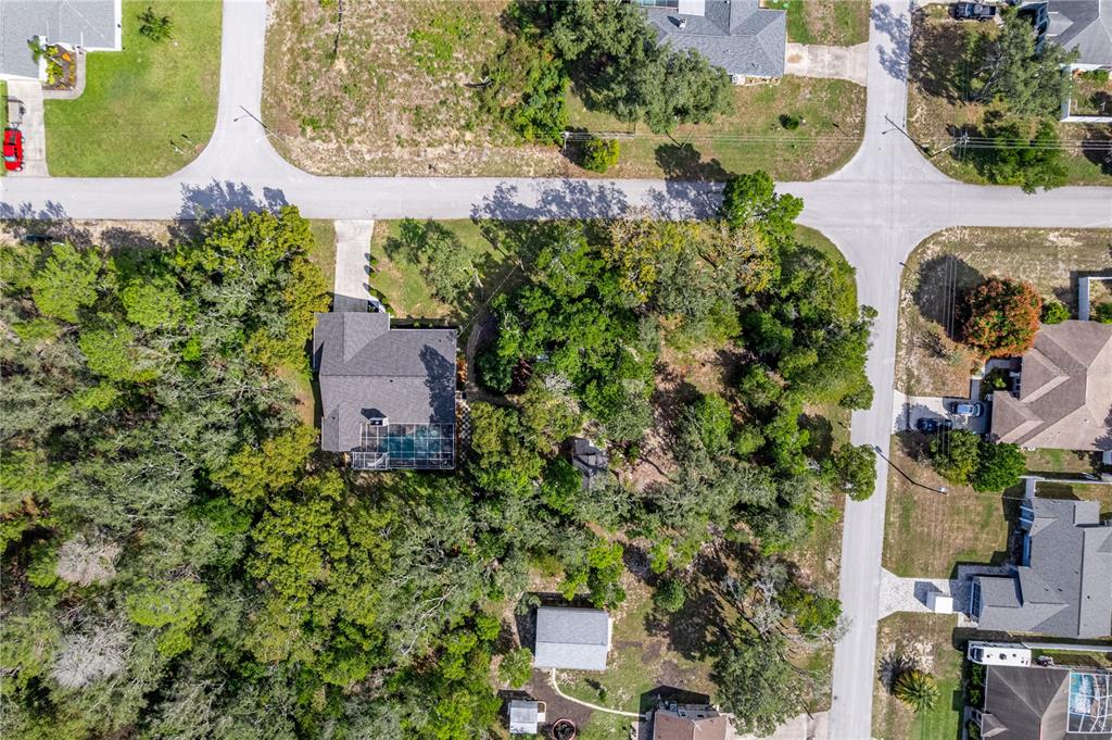 8480 Colma Street Spring Hill, FL 34606 - Photo 60 of 70 an aerial view of a house with a garden