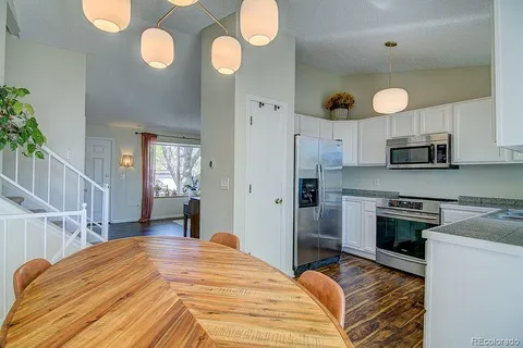 a bed room with cabinets and bed