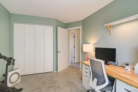 a view of a livingroom with furniture