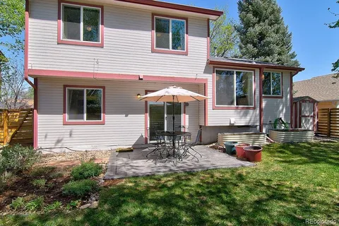 a front view of a house with patio